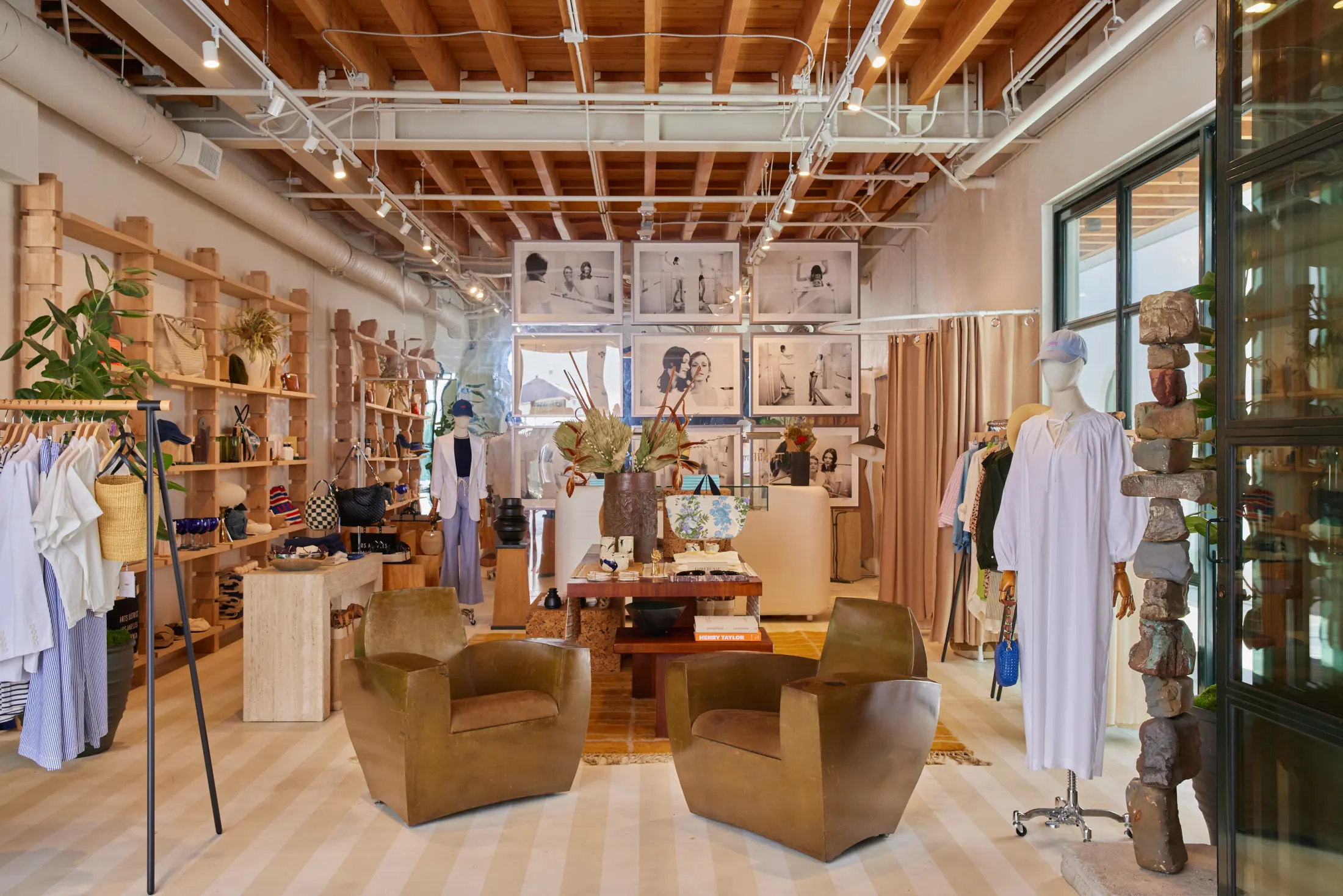 Inside the Alchemy Works shop at Signal, with clothing and leather armchairs