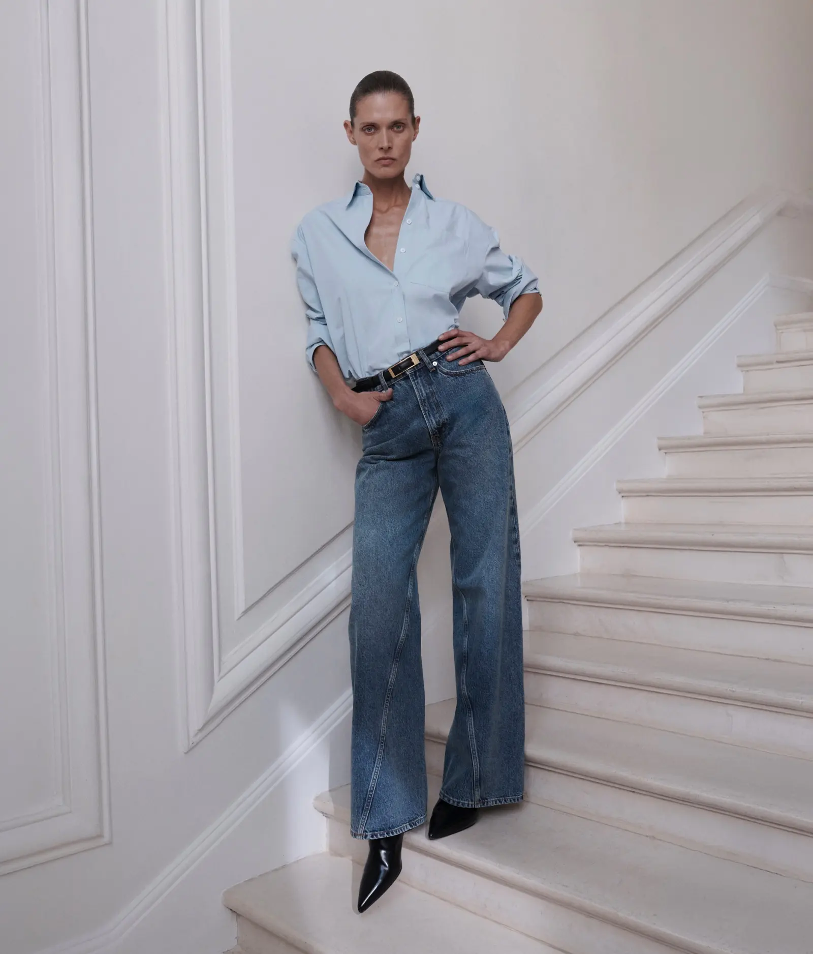 Anine Bing wide-leg jeans and a blue shirt