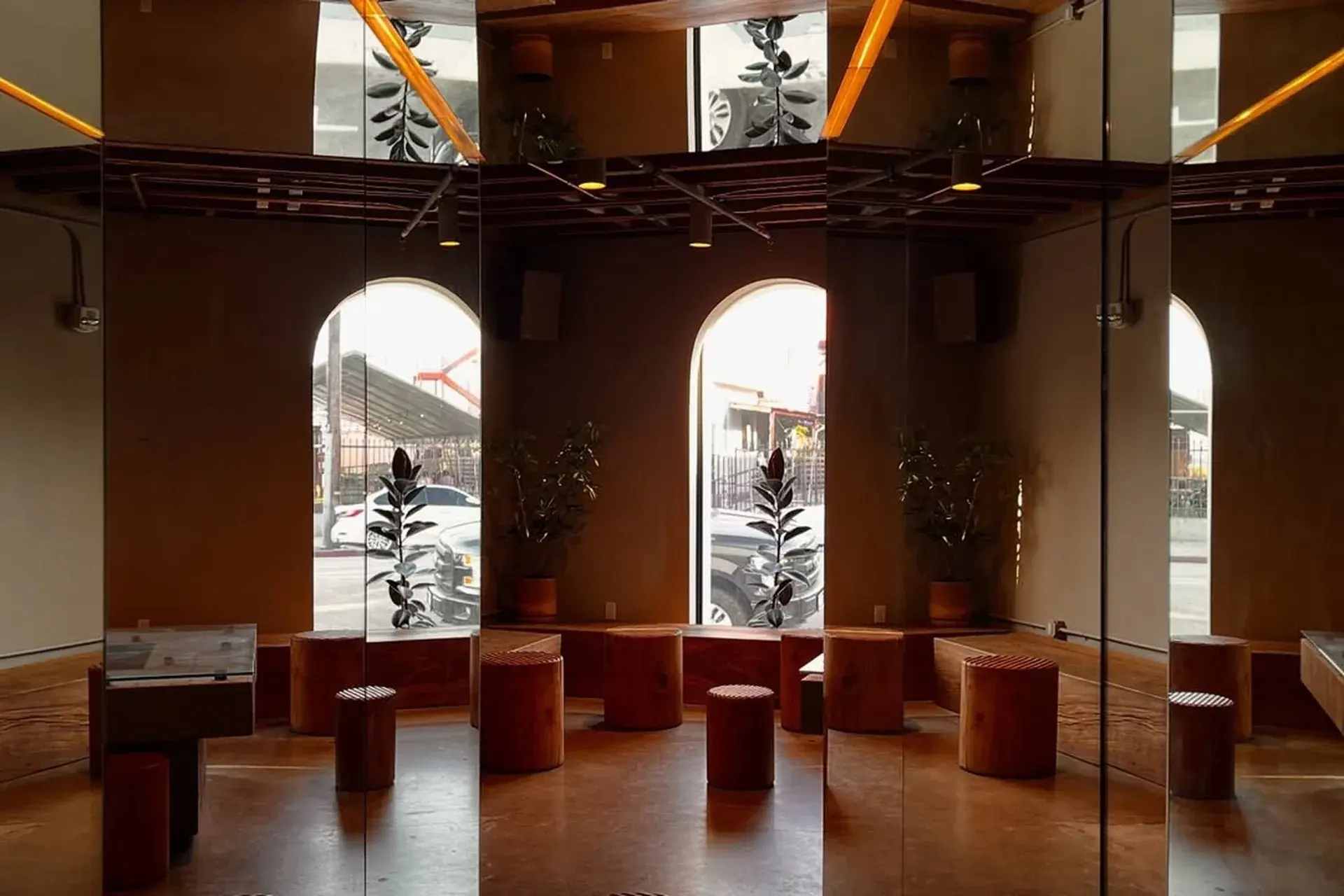 The Concierge Coffee cafe at Signal, with arched windows and wooden stools