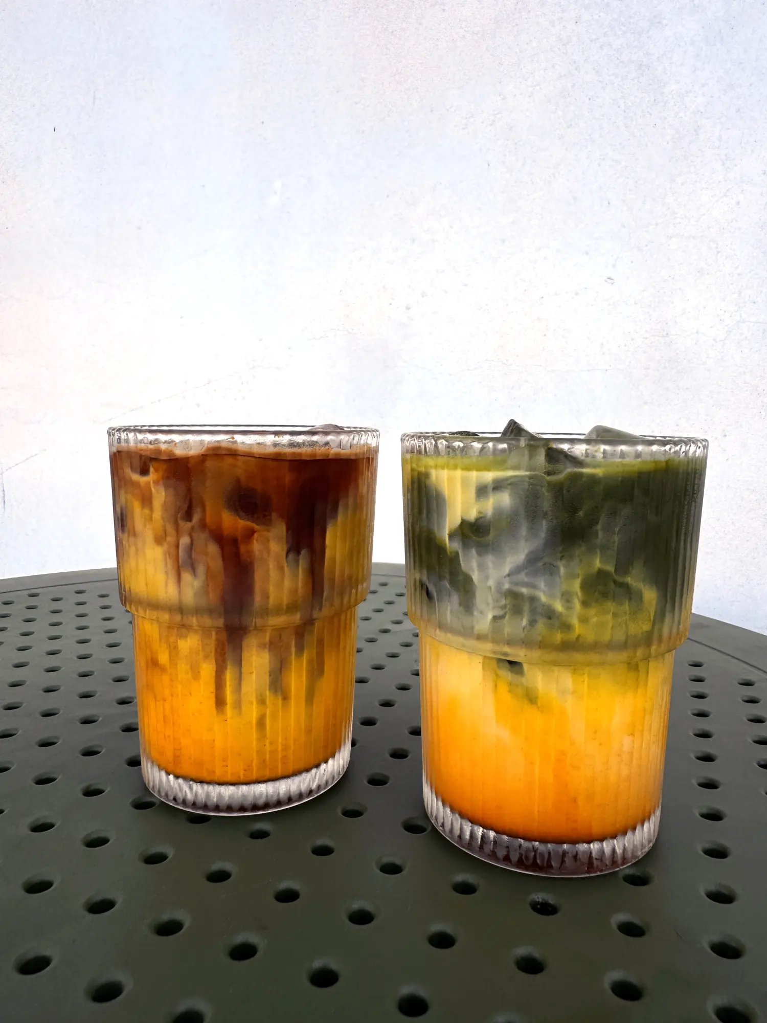Two layered iced drinks at Concierge Coffee