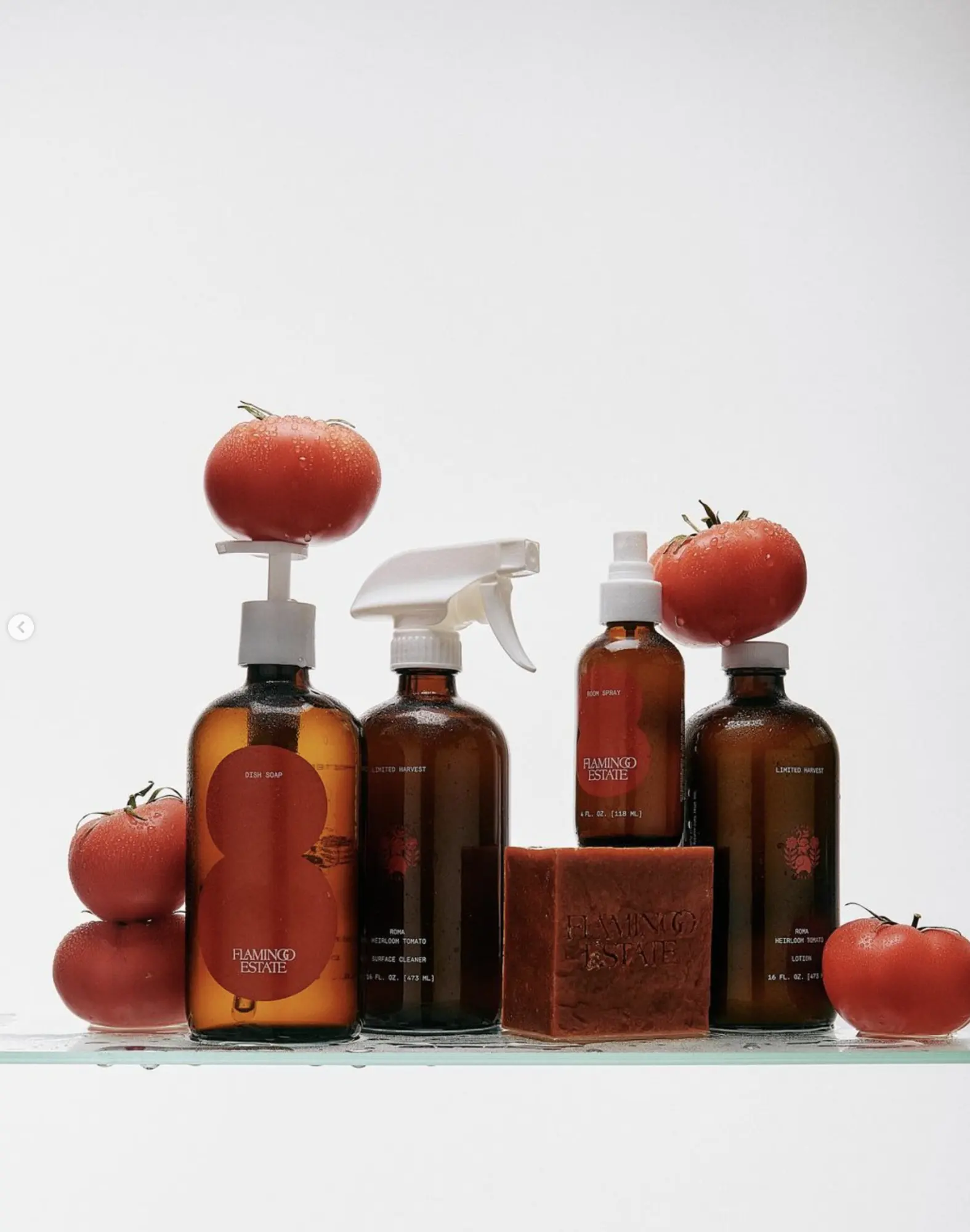 Flamingo Estate body care bottles with tomatoes